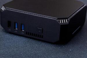 A small system unit of a personal computer. Compact device. photo
