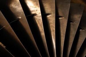 Metal blades. Aircraft turbine detail photo