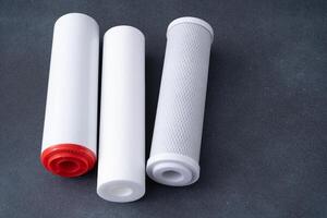 Water filters. Carbon and mechanical filter for home. photo