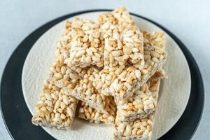 Sweet puffed rice. Food dessert crispy cracker with sugar photo