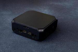 A small system unit of a personal computer. Compact device. photo