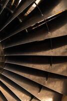 Metal blades. Aircraft turbine detail photo