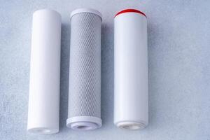 Water filters. Carbon and mechanical filter for home. photo