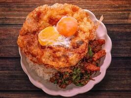 The pad krapow or Beef basil rice and egg Thai food. photo