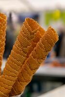 stacked empty ice cream cones at a sales stand photo