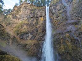 Close-up of the roaring Multnomah Falls from the Multnomah Creek Bridge on a February day. photo