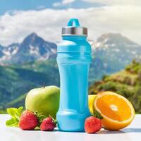 Mockup sport drink bottle with fruits on mauntains background, health concept on nature photo