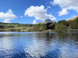 A view of Loch Lomond in Scotland on a sunny day photo