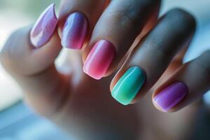 A close up of female nails with a beauitful nail polish. photo