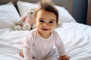 A cute baby smiling at you. photo