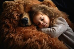 A little girl sleeping in the arms of a huge teddy bear. photo