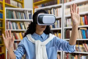 A curious student immerses in a virtual reality experience, surrounded by books in a library setting, showing engagement and technology in education. photo