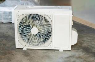 HVAC Air Conditioning on the floor, Air conditioning technicians prepare to install new air conditioners in home photo