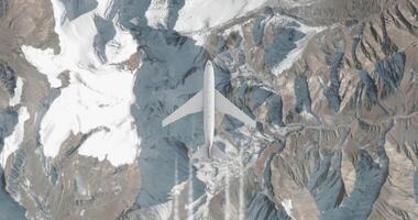 avião vôo sobre Nevado montanhas. carga ou passageiro avião voo, Visão a partir de a topo video