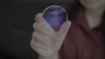 Hand doctor holding glasses lenses in optical store, eyeglasses lenses video