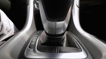 Car automatic transmission. Shifting automatic transmission to drive mode. Close up view video