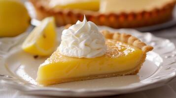 A delicate lemon tart flaky crust filled with tangy lemon curd and topped with a dollop of fresh whipped cream photo