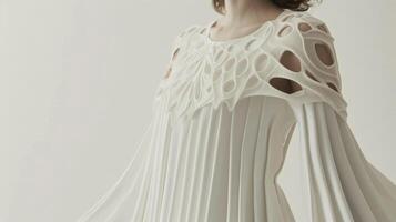 This dress combines a flowing fabric with 3D printed lattice sleeves for a stunning mix of softness and structure photo