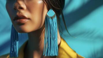 A pair of statement earrings with 3D printed fringe details adding a touch of edginess to any outfit photo