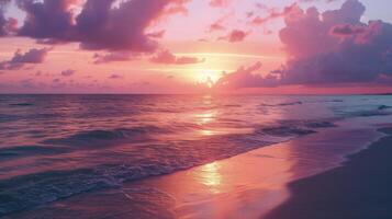 Background Deep hues of pink and orange adorn the sky as the sun sets over the ocean creating the perfect backdrop for a romantic getaway photo