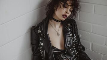 Edgy Glamour A studded leather jacket paired with a satin slip dress combat boots and statement choker for a mix of edgy and gl Y2K style. Perfect for a night out in the cit photo