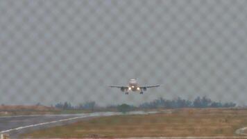 Jet plane approaching to landing. Footage of an airliner descending. Airplane flying, front view video