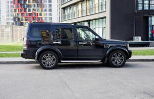 Minsk, Belarus, May 3, 2024 - Black Land Rover photo