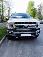 Minsk, Belarus, May 6, 2024 - Ford F-150 XLT parked on street photo