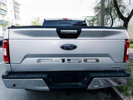 Minsk, Belarus, May 6, 2024 - Rear view silver Ford F-150 photo