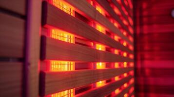 un de cerca de un sauna panel demostrando el rojo resplandor de el infrarrojo ligero y sus capacidad a tratar el cuerpo para profundo relajación. foto