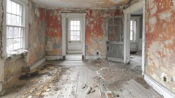 A photograph of a room undergoing wallpaper removal showing the messy process of peeling away old wallpaper photo