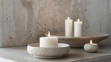 The white candles seem to amplify the raw and natural beauty of the concrete holders highlighting their unique imperfections. 2d flat cartoon photo