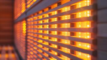A closeup of the infrared panels within a sauna emitting gentle heat that can help soothe aches and pains for older individuals. photo