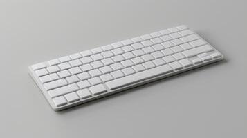 Blank mockup of a minimalist silver keyboard with no visible markings photo