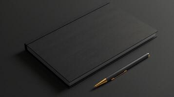 Blank mockup of a professional notepad with a sleek black cover and gold foil accents. photo