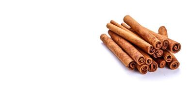 AI generated cinnamon sticks on white background Generative AI photo