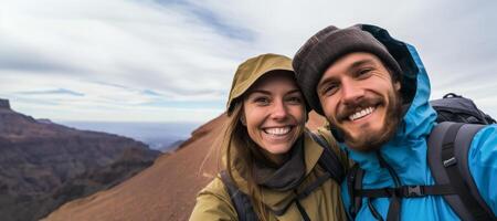 AI generated happy couple taking selfie on mountain peak Generative AI photo