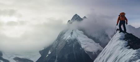 ai generado rock trepador en parte superior de Nevado montañas generativo ai foto