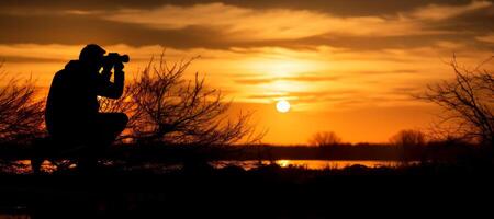 ai generado fotógrafo silueta a puesta de sol fauna silvestre generativo ai foto