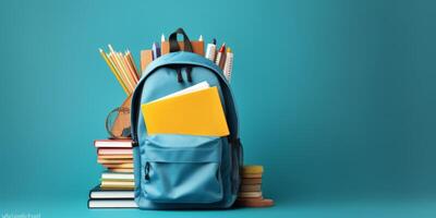 AI generated backpack with school supplies on blue background Generative AI photo