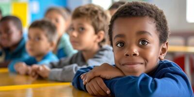 primary school children at school desk photo