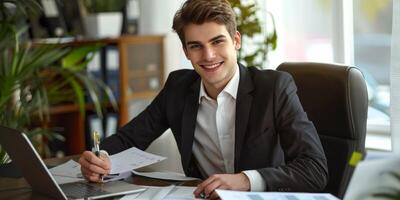 businessman at laptop in office photo