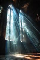 bright rays of light penetrating through the windows of the church photo