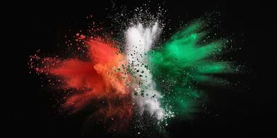 explosion of multi-colored powder on a black background photo