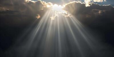 bright rays of light break through the clouds photo