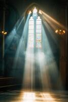 bright rays of light penetrating through the windows of the church photo