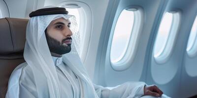 Arab businessman in a business jet photo