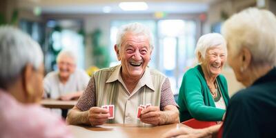 elderly people playing cards in a nursing home photo