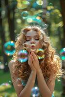 child blowing soap bubbles in nature photo