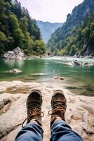 traveler's feet on the rocks photo